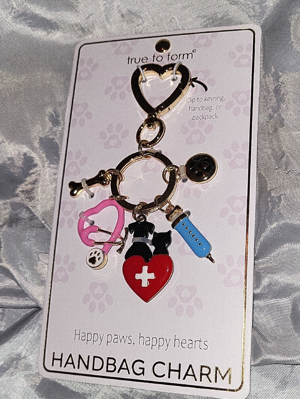 True to Form Gold Pet-Themed Handbag Charm with Red Heart and Pink Stethoscope